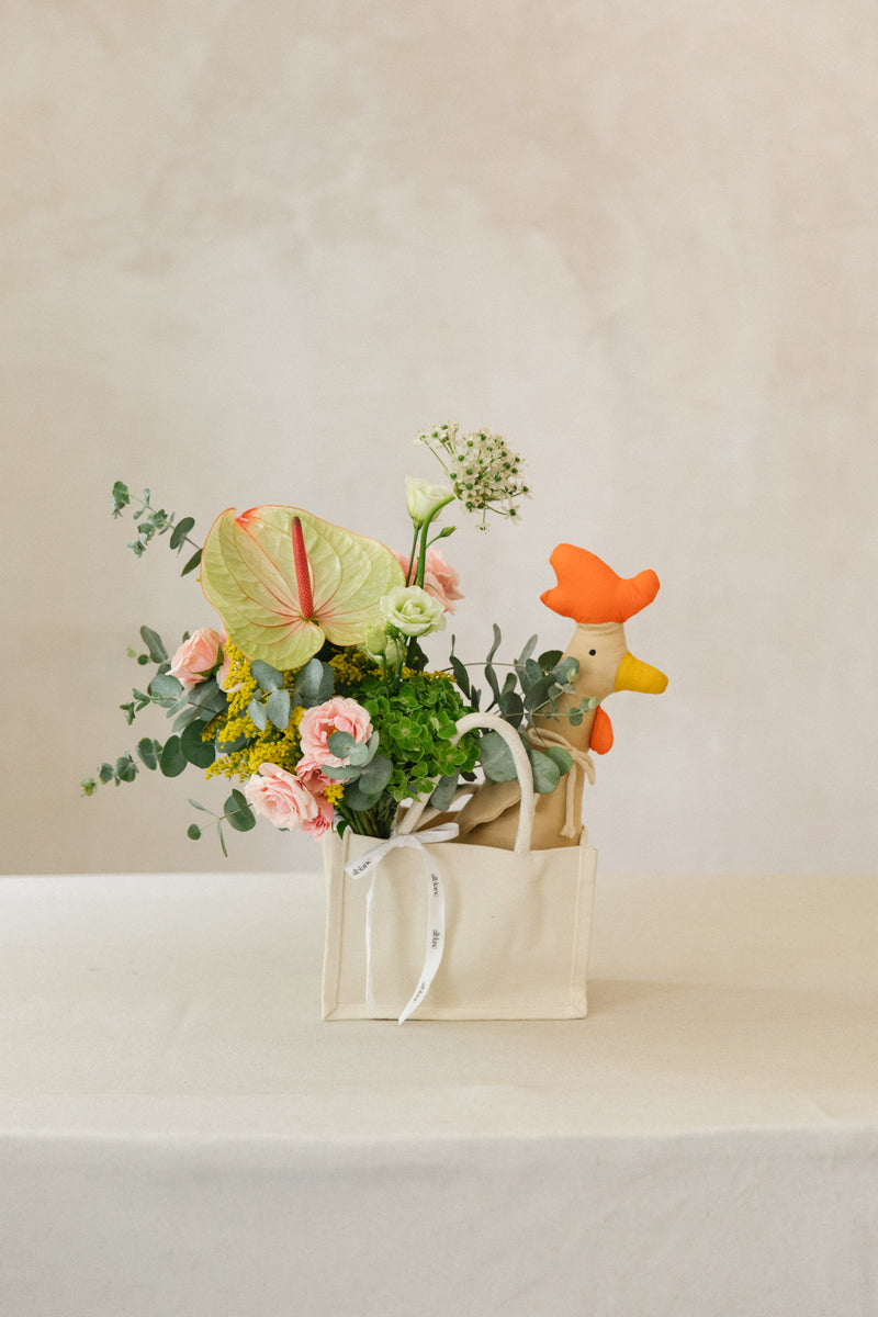 Bolsa de flores para recibir al nuevo bebé. Pack naranja y rosa